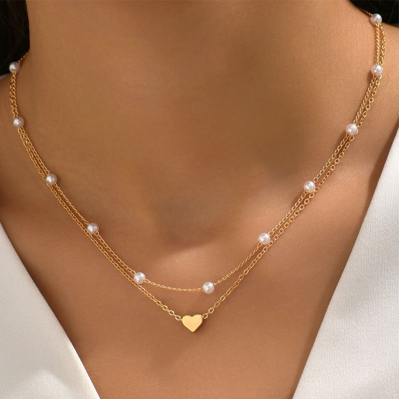 European and American cross-border jewelry Fashion new pearl necklace female personality Y-shaped pearl tassel stacking clavicle chain necklace
