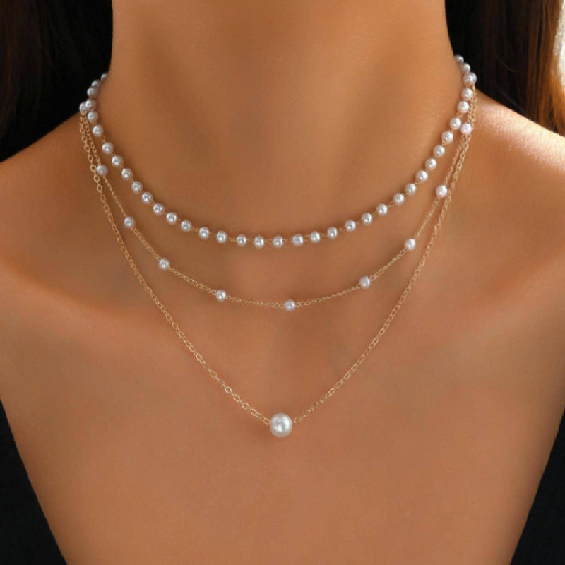 European and American cross-border jewelry Fashion new pearl necklace female personality Y-shaped pearl tassel stacking clavicle chain necklace