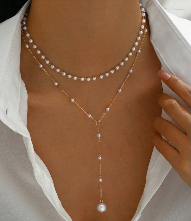 European and American cross-border jewelry Fashion new pearl necklace female personality Y-shaped pearl tassel stacking clavicle chain necklace