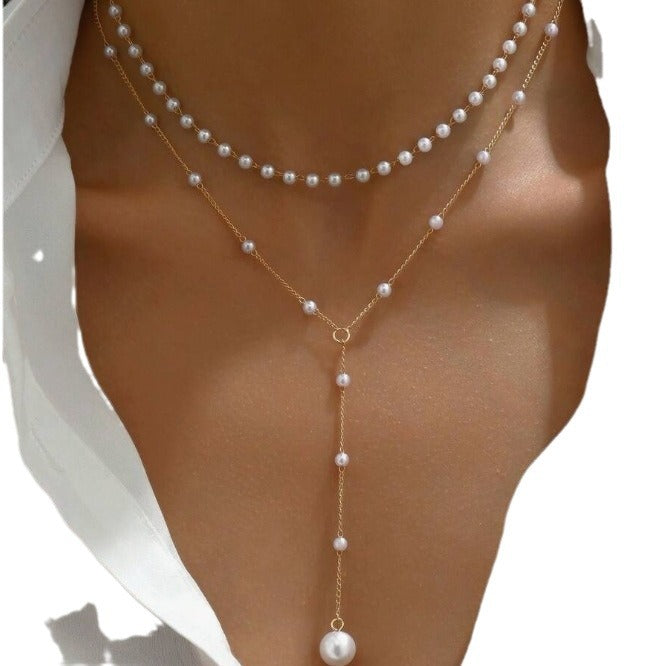 European and American cross-border jewelry Fashion new pearl necklace female personality Y-shaped pearl tassel stacking clavicle chain necklace
