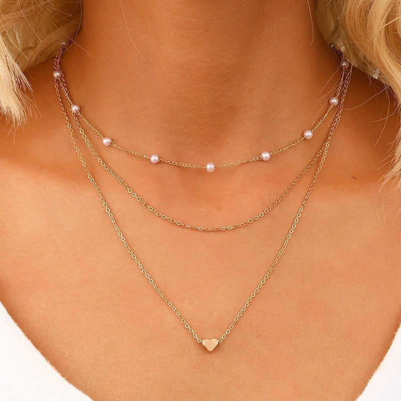 European and American cross-border jewelry Fashion new pearl necklace female personality Y-shaped pearl tassel stacking clavicle chain necklace